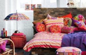Colorful textiles can elevate your home decor. Explore vibrant home color ideas to infuse personality and warmth into your space.